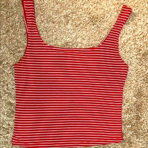 A little cropped red striped shirt.